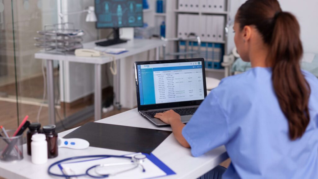 Medical worker adding medical information to the system