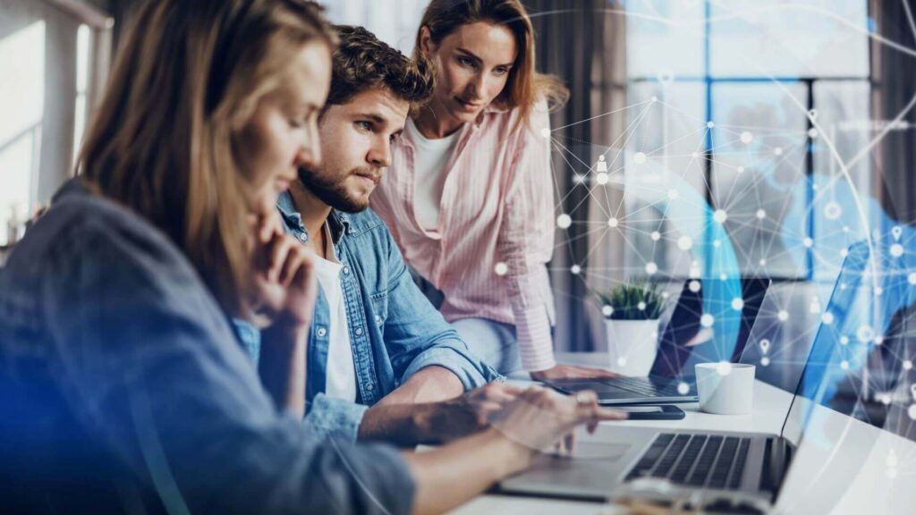 Team discussing Salesforce Sales Cloud implementation.