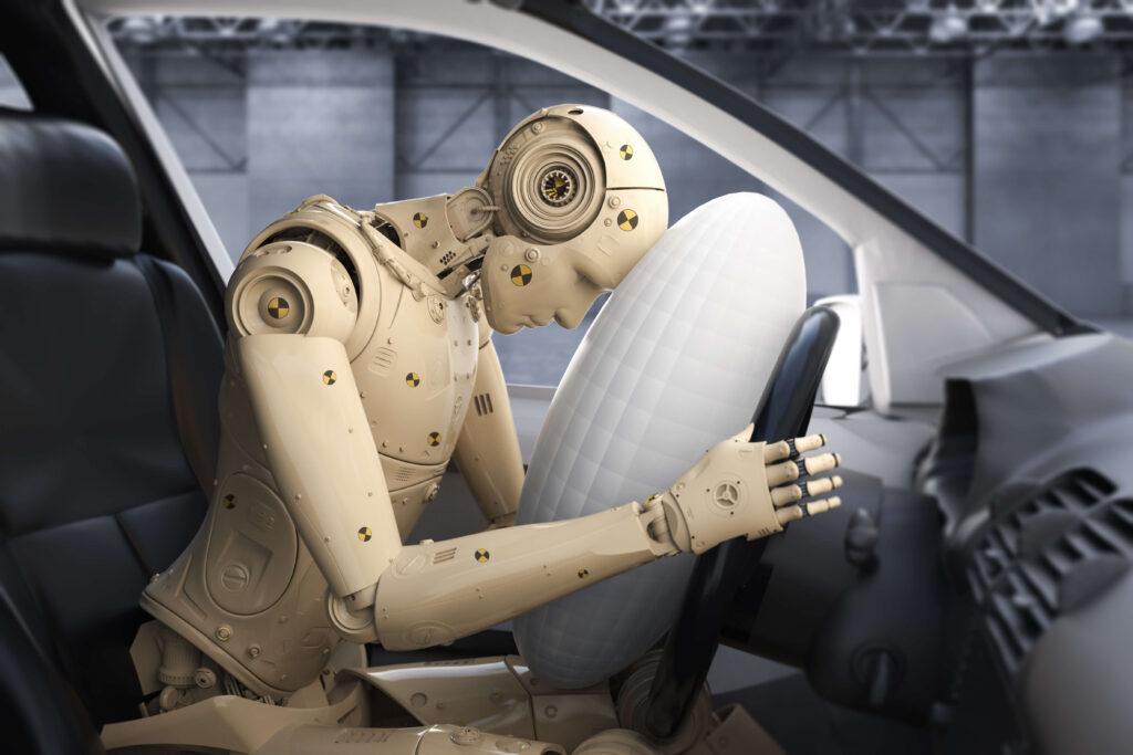 Crash test dummy behind the wheel