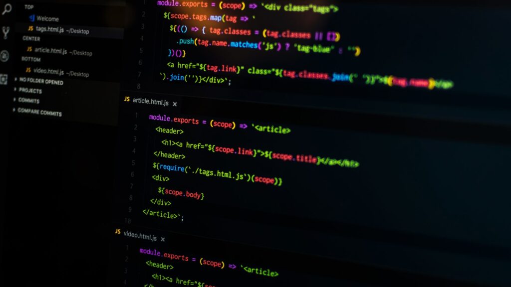 A close-up of JavaScript code in a dark-mode editor, symbolizing the software maintenance and application management tasks performed during the 'Operate' stage of a Build-Operate-Transfer (BOT) project
