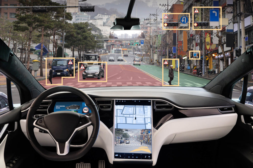 A view from an autonomous car, showing how their systems scan each object on the street