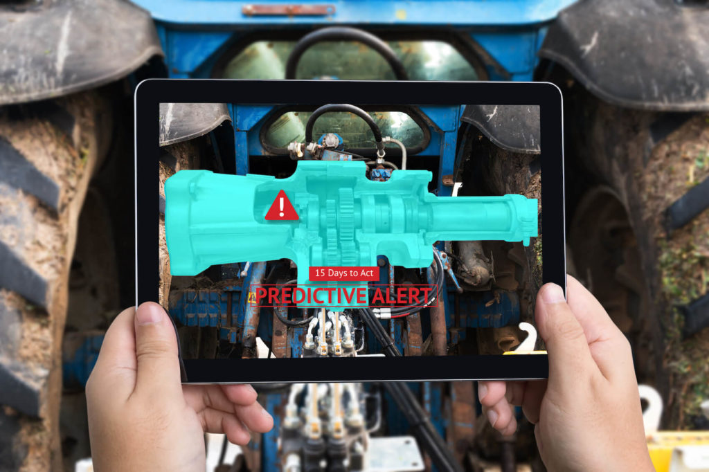 AI-  machine learning and data science - AI predictive maintenance - a tablet showing predictive maintenance alert for a utility part