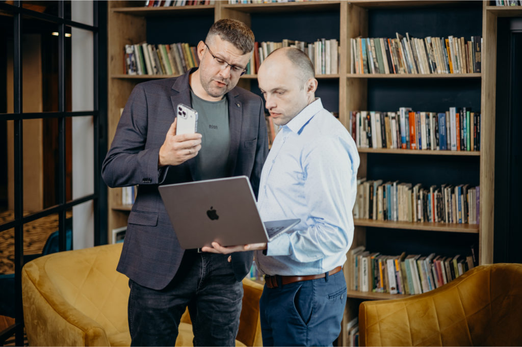Two men discussing Salesforce setup.