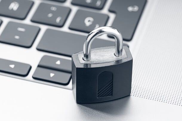 Publishers – close-up of padlock on laptop keyboard symbolising data protection and content security
