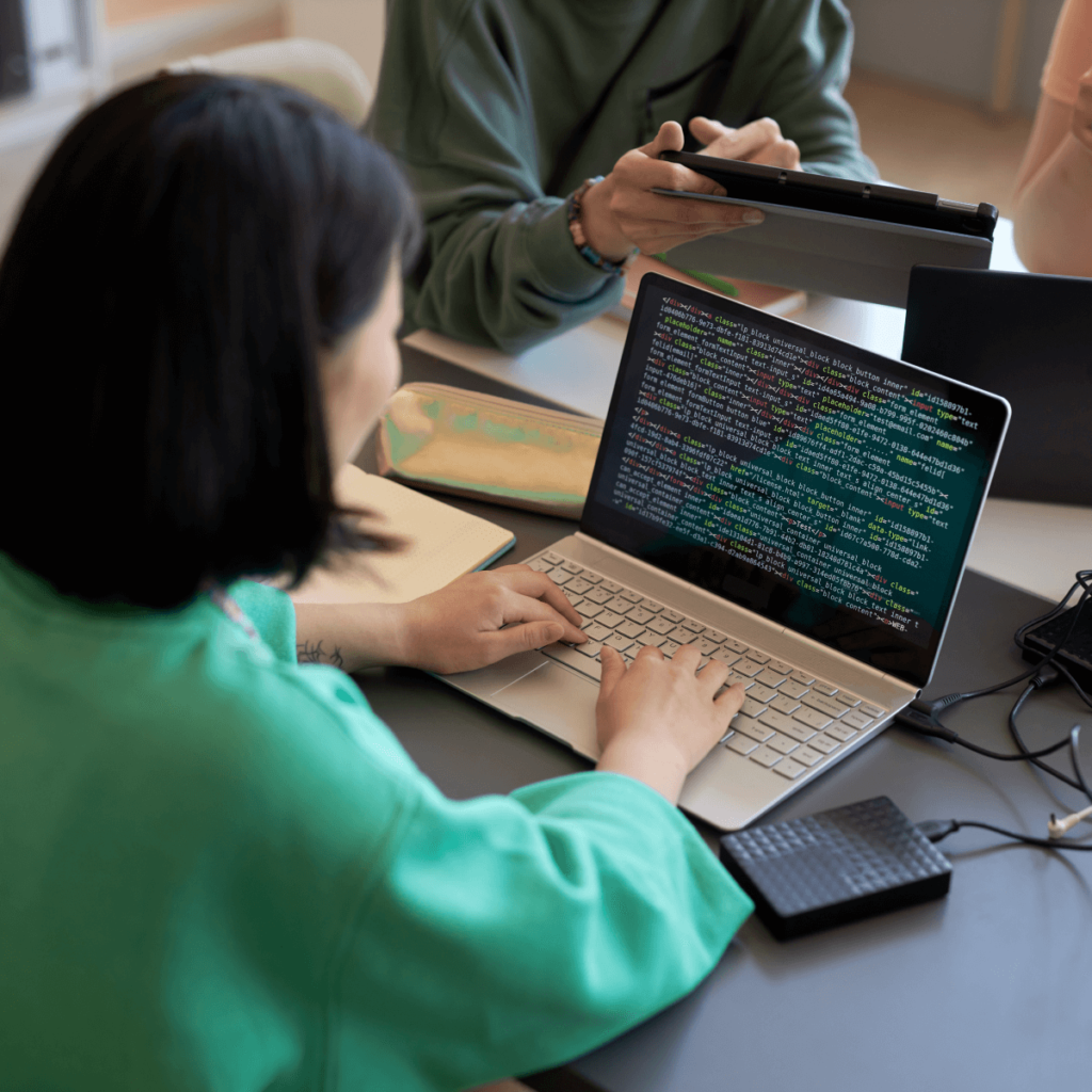 the woman with a laptop, coding, project for broadcasters