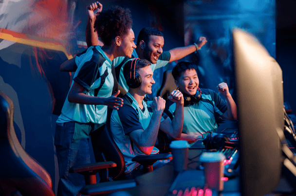 Esports team celebrating victory in gaming tournament – real-time experience in iGaming software development