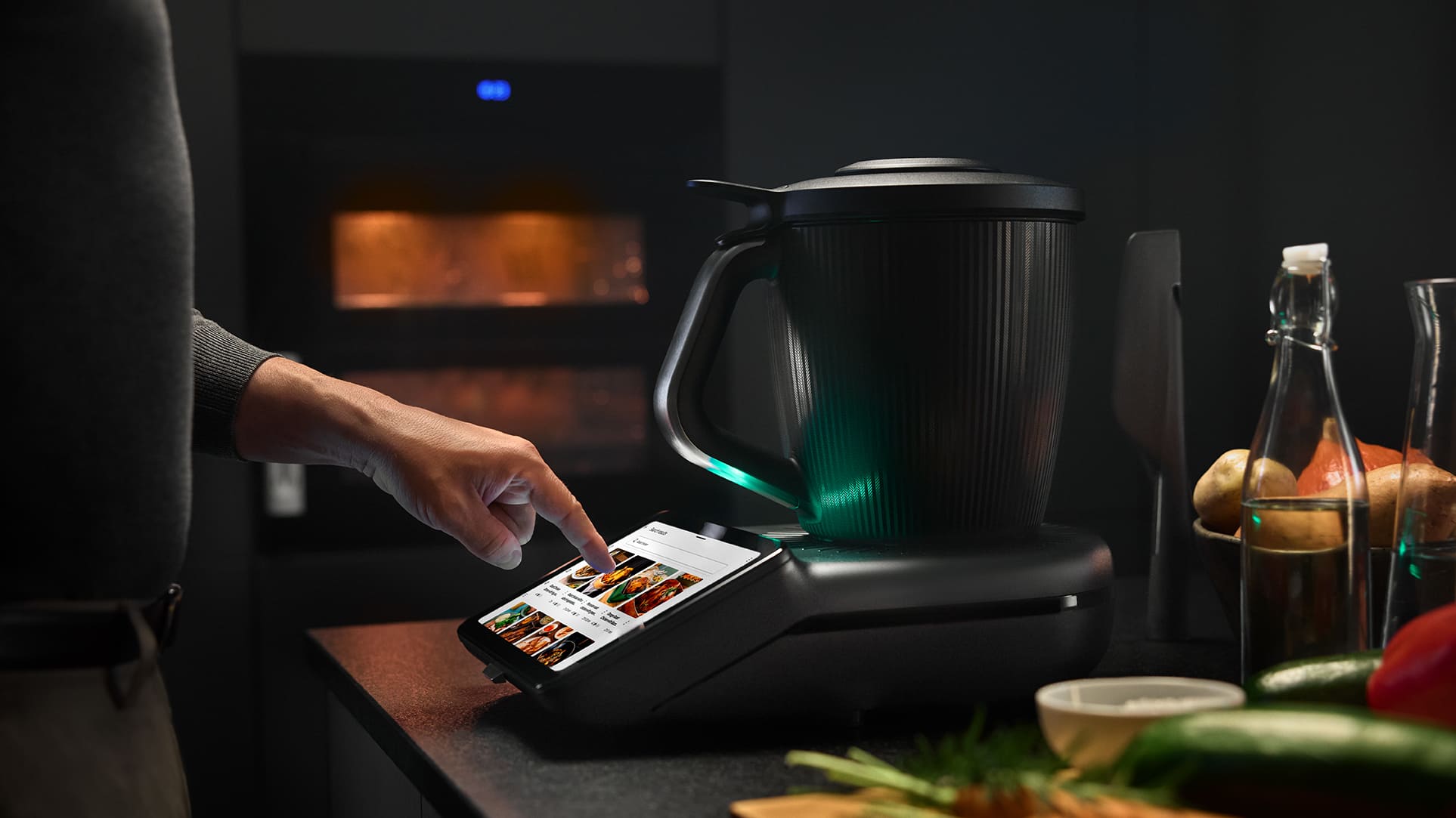 a lifestyle photo showing thermomix 7 and its interface