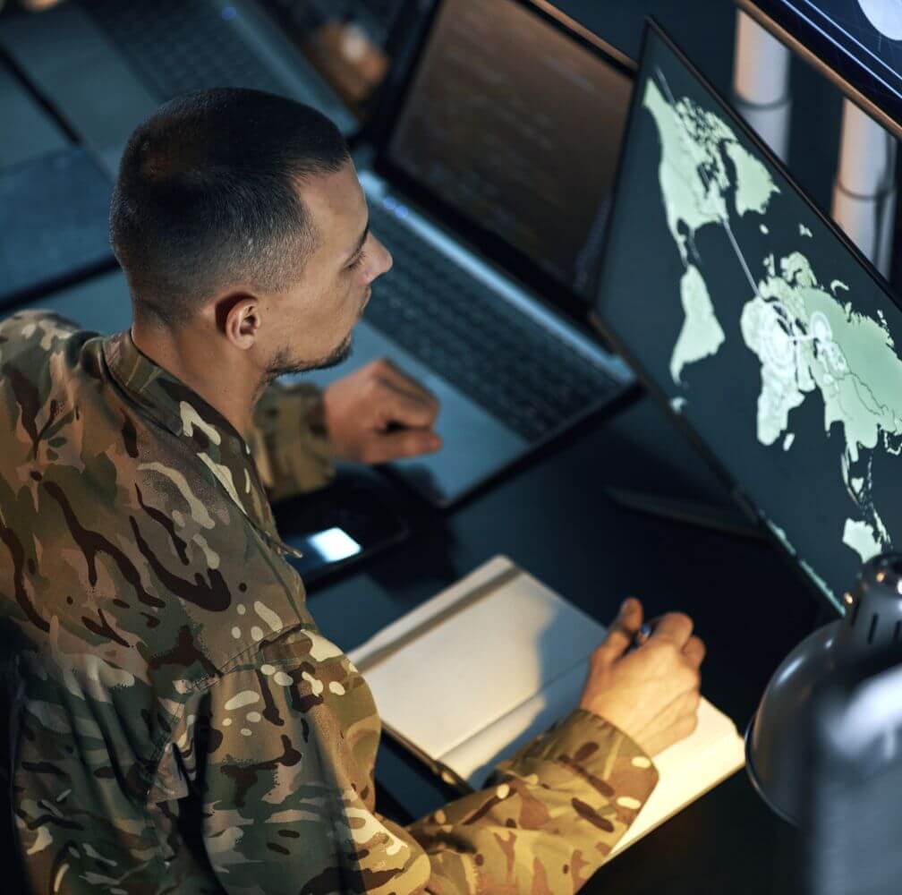 A man operating a defence security system
