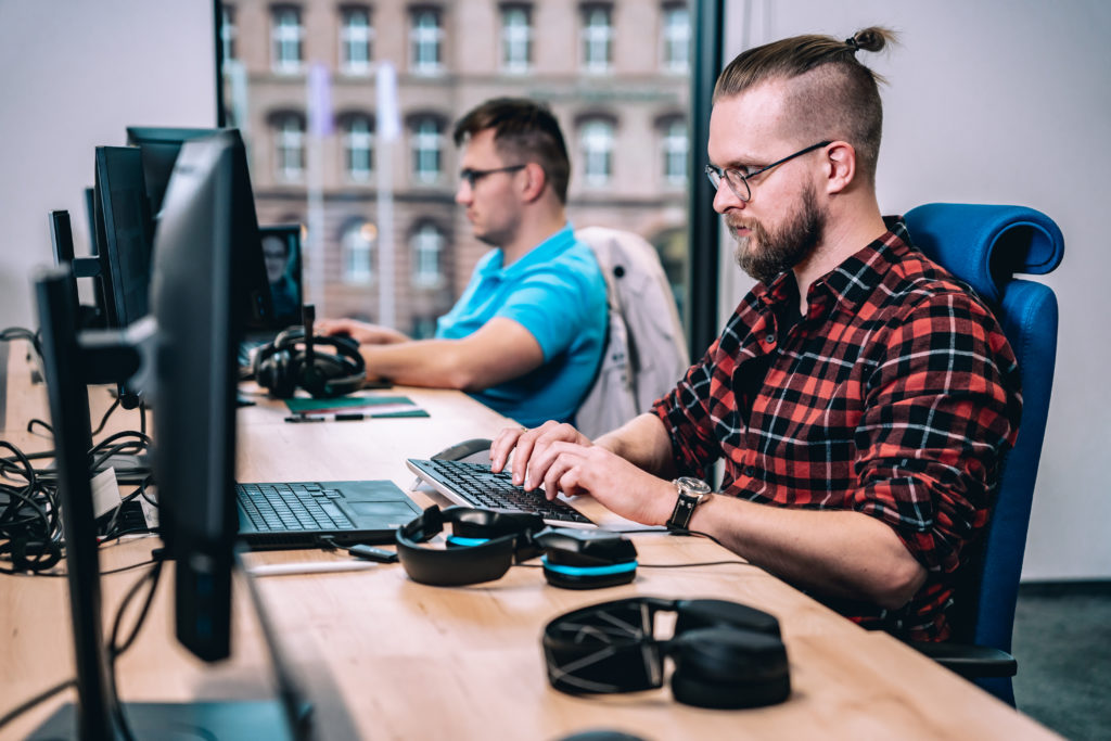 Spyrosoft developers working on custom software development for AdTech & MarTech development