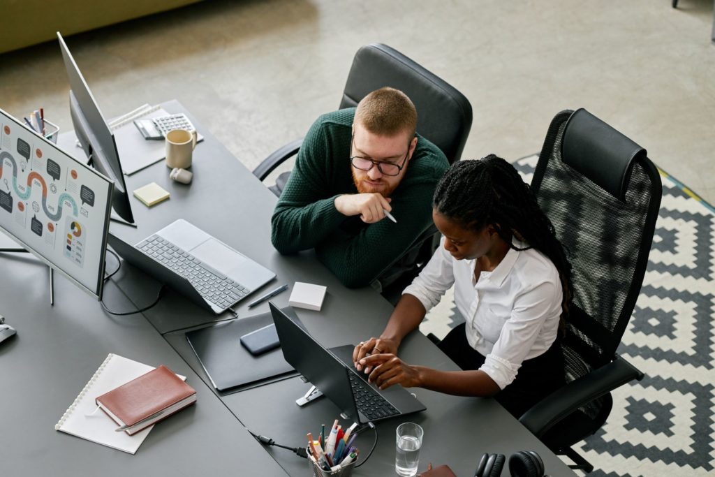 Software Development Manchester_Two colleagues working on the discovery phase of software development in Manchester