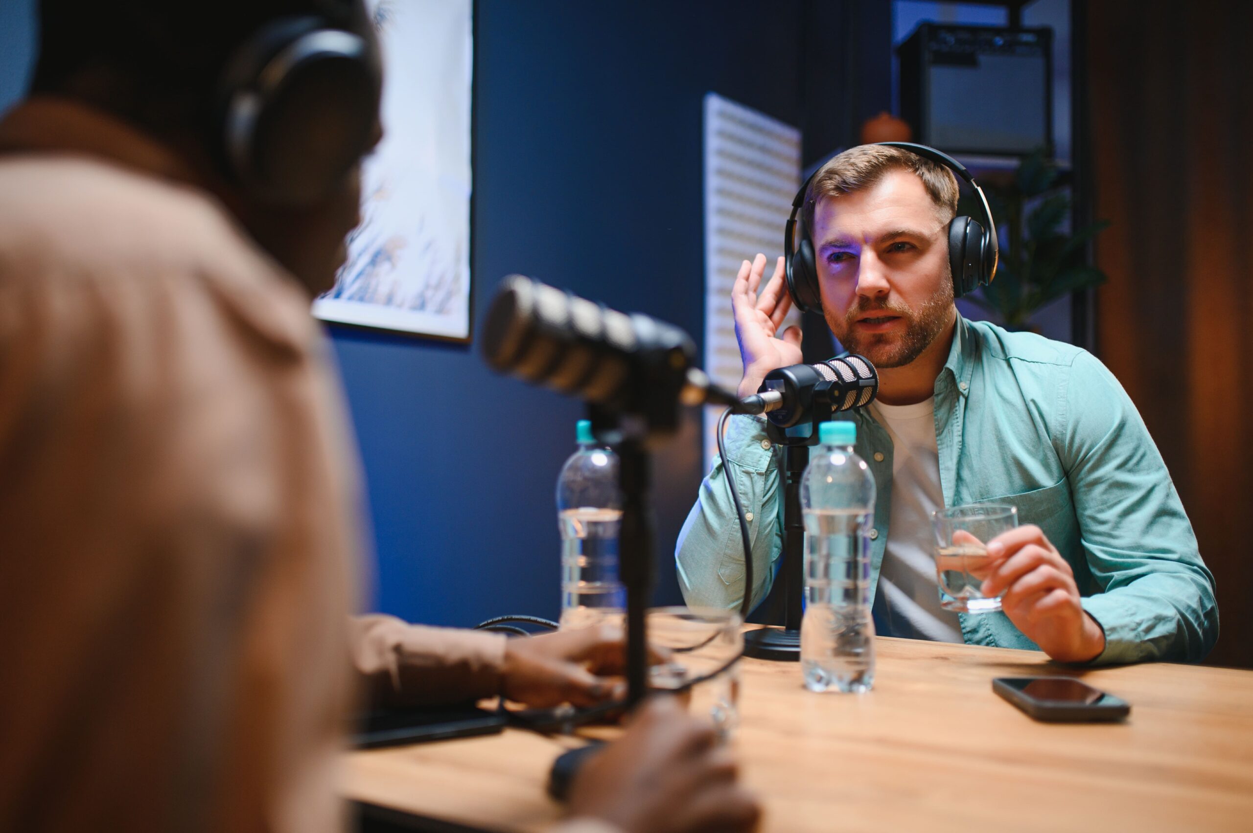 Content creators recording a podcast – producing engaging digital content supported by modern media production and distribution tools.