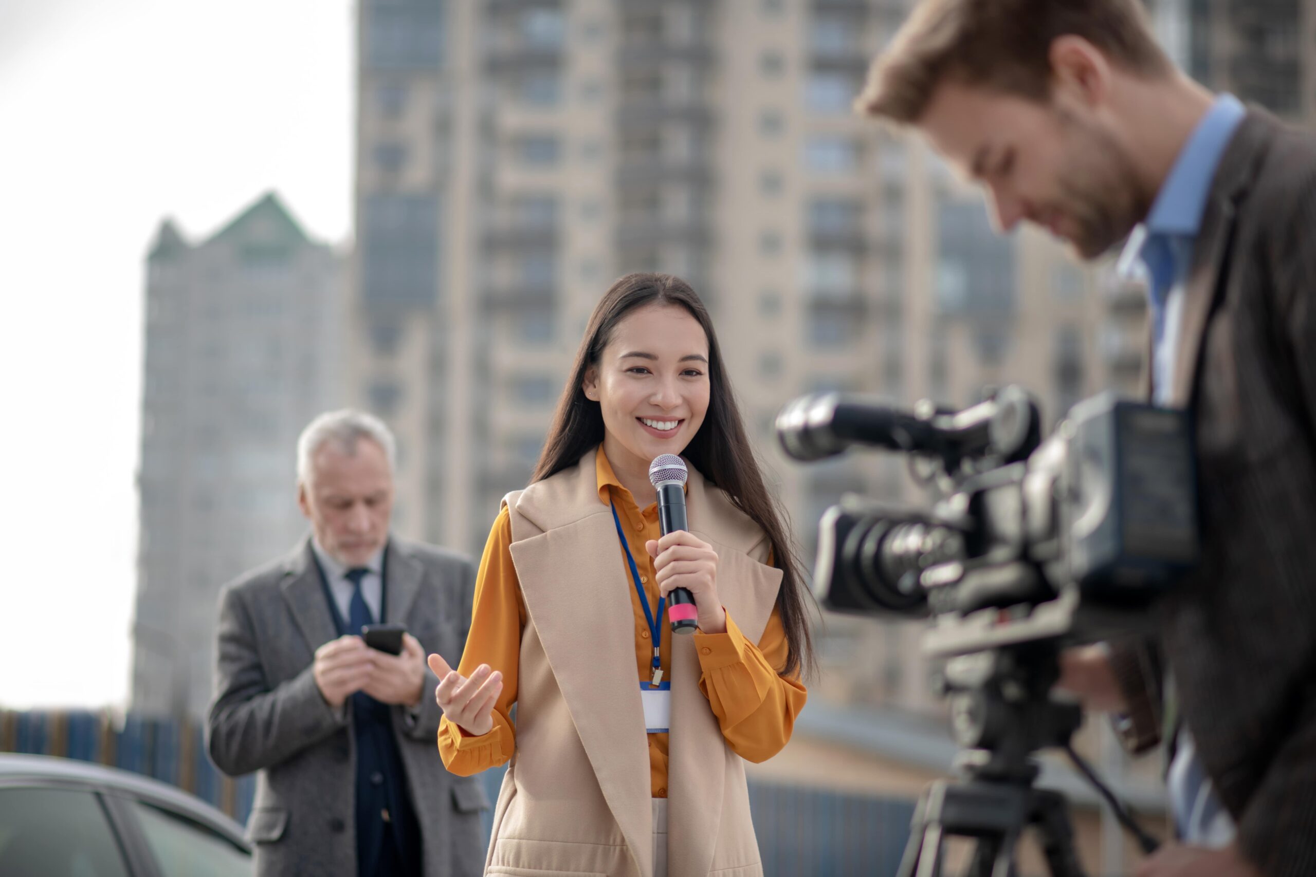 Reporter speaking on camera during outdoor shoot – professional broadcasting powered by media software solutions