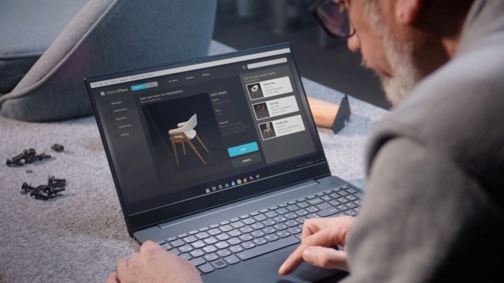 Ecommerce development - Digital transformation strategy for ecommerce. Business owner uploads pictures of wooden chair to online store