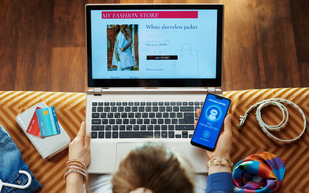 Person using AI customer support system while shopping