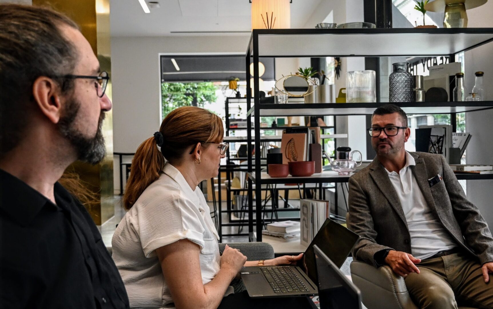A group colleagues hang out in the chill room at Spyrosoft's London site.