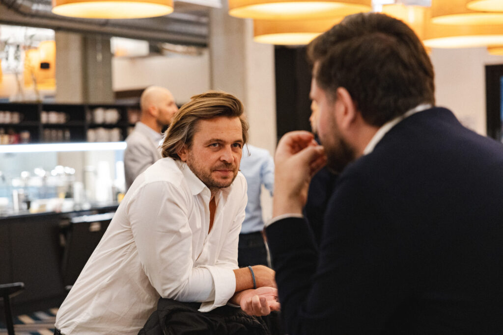 Spyrosoft employees in Krakow talk in the Chillout zone during one of the events organized by the company