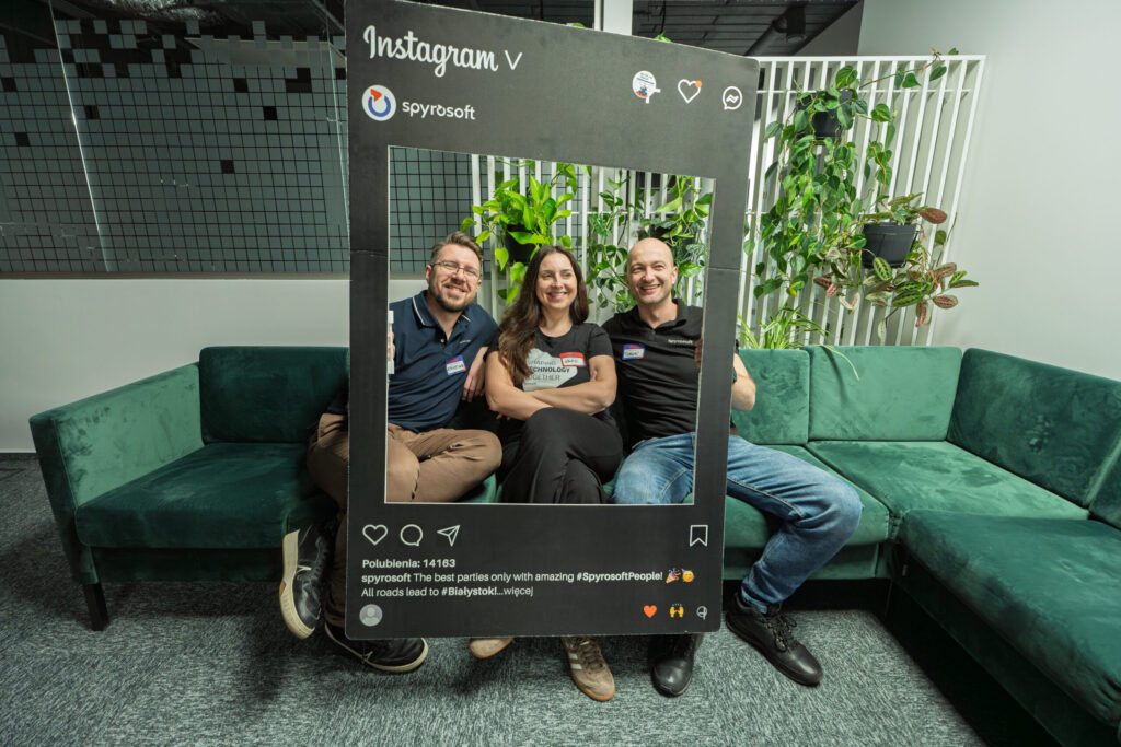Smiling Spyrosoft employees during an event at the Bialystok office